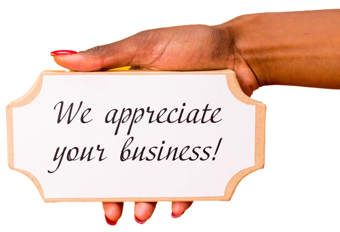 a hand with a sign that reads: We appreciate your business!