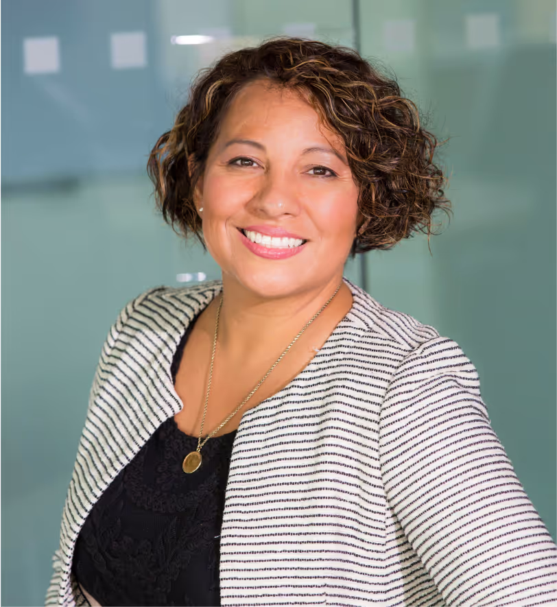 Smiling latina woman executive posing for the camera